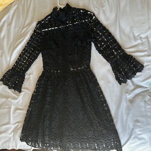 Brand new Eilly Bazar black dress. Size small, tag still attached.